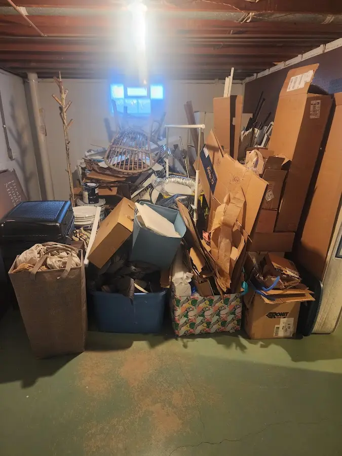 Roll-off dumpster container at job site for 2 Yard Dumpster Rental in Oakwood